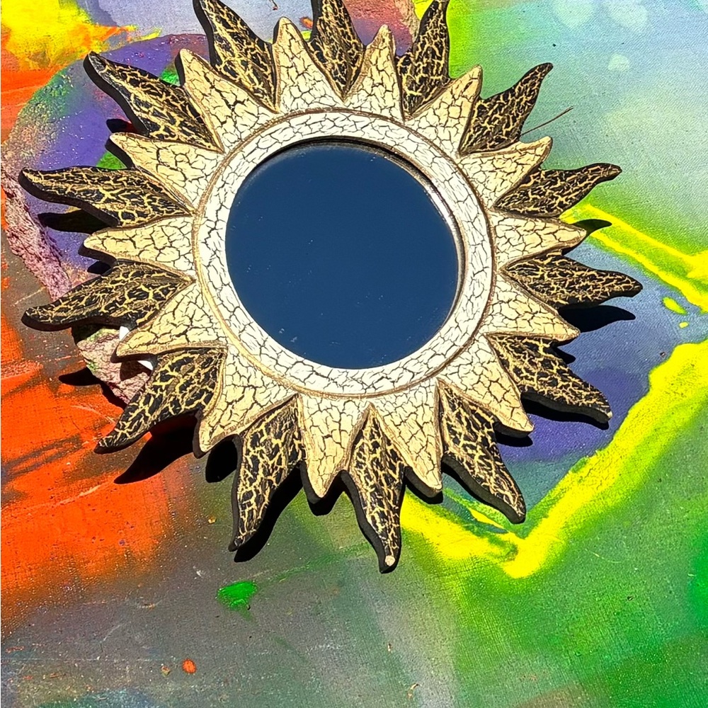 Elegant Sunburst Wall Mirror in Black and Cream